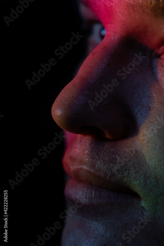 a man's face with a contrasting color