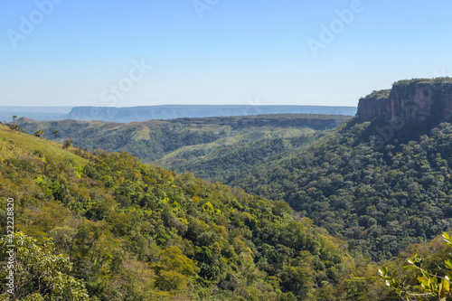 Landscape with green hills and blue sky in the Chapada dos Guimaraes Nationalpark in Mato Grosso, Brazil