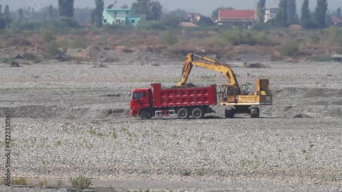 Gravel extraction from the riverbed of the Mati River in rural Albania photo