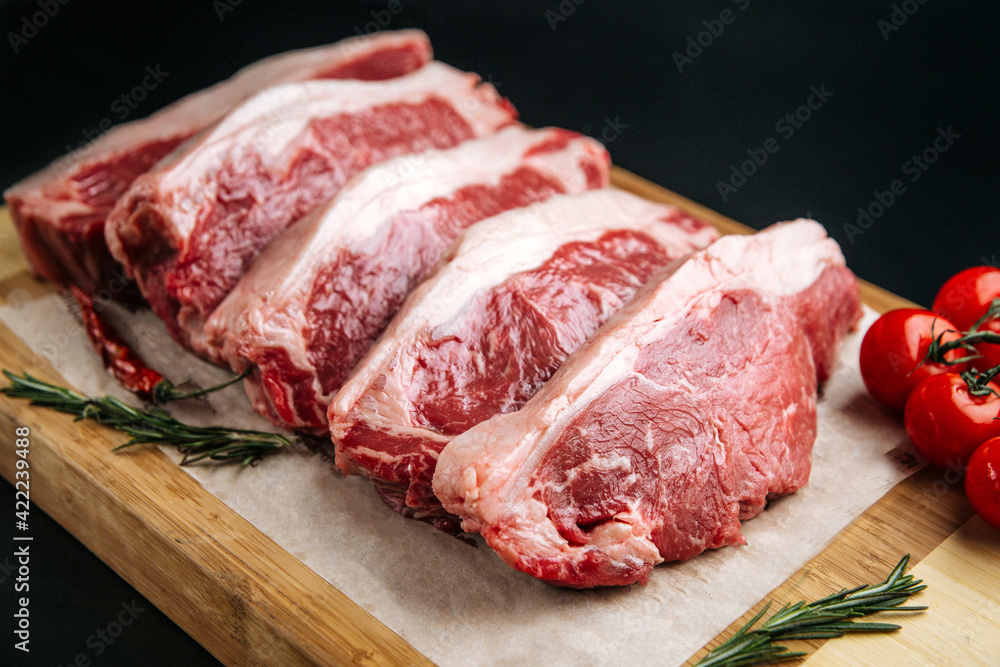 Closeup on raw veal meat tenderloins cooking preparation Closeup on raw veal meat tenderloins cooking preparation