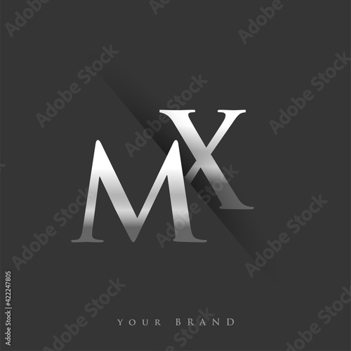 initial logo letter MX for company name, silver color and slash design in black background. vector logotype for business and company identity. photo