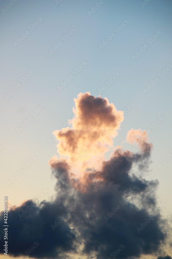 golden sunset sky, orange fluffy cumulus clouds, vivid evening sky