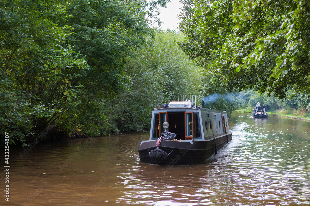 Passing traffic on the Llangollen Canal at Whixall Moss, on the England/Wales border Passing traffic on the Llangollen Canal at Whixall Moss, on the England/Wales border