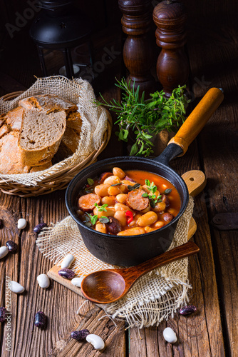 Delicious bean stew with sausage and potato