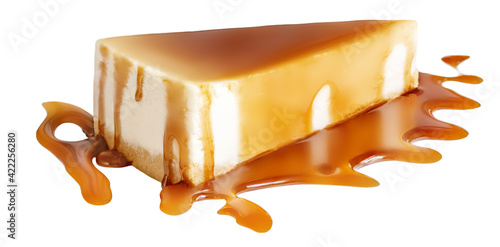 Slice Of Cheesecake with caramel sauce  isolated on a white background. Piece of delicious caramel cake close up. photo