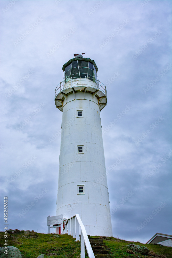 Close-up of Cape Egmont Lighthouse on a gloomy winter day. Taranaki, New Zealand