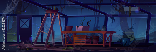 Abandoned greenhouse at night, scary interior