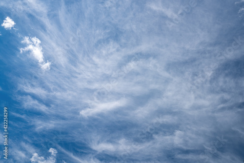 Beautiful sky background with picturesque cirrostratus clouds photo