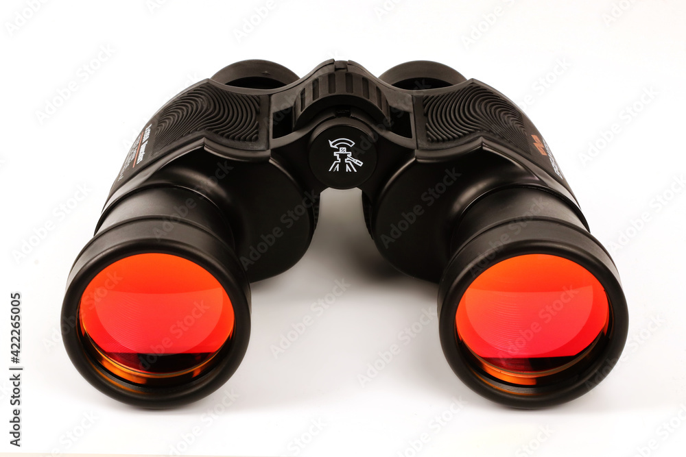 Black binoculars on a white background Black binoculars on a white background