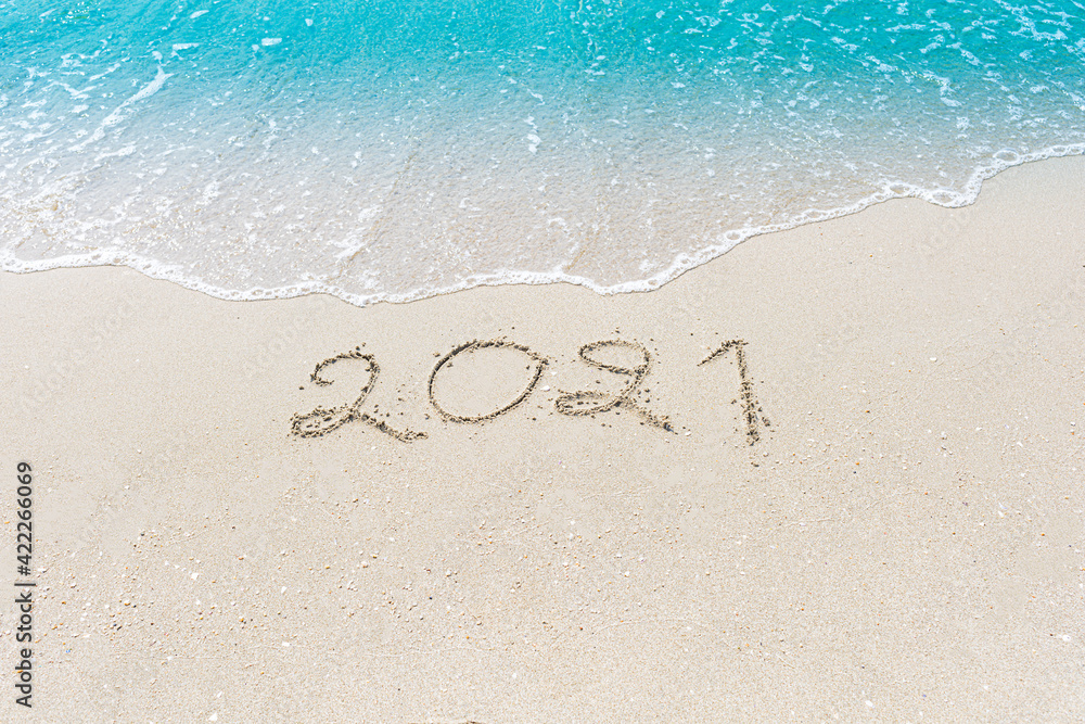 Fototapeta premium Happy New Year 2021 is coming concept sandy