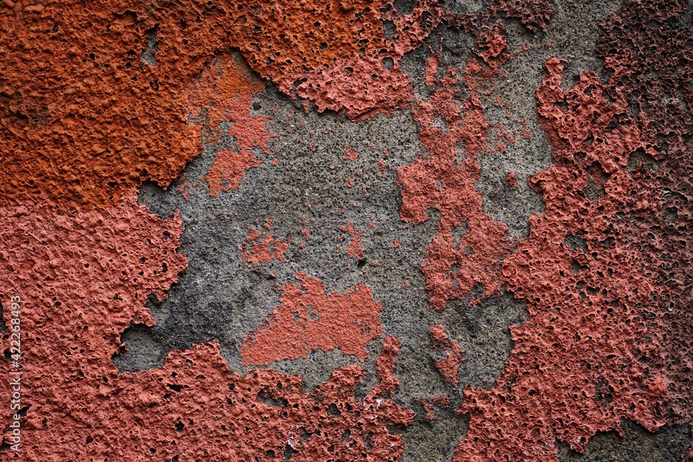 red stone building wall, textured abstract background