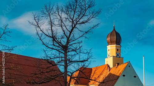 Beautiful winter view with a church at Schwarzach center, Bavaria, Germany