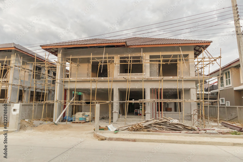 construction residential new house in progress at building site construction residential new house in progress at building site