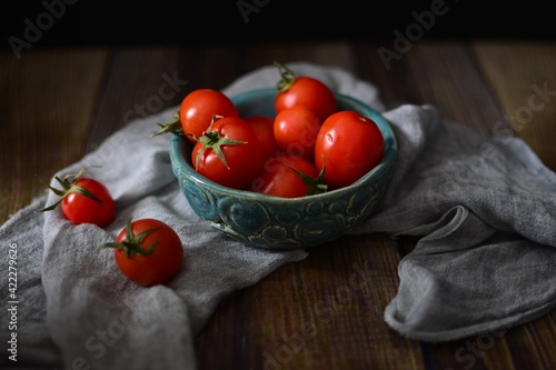 tomatoes on a wooden table photo