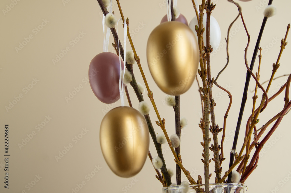 Composition with Easter eggs and blooming branches