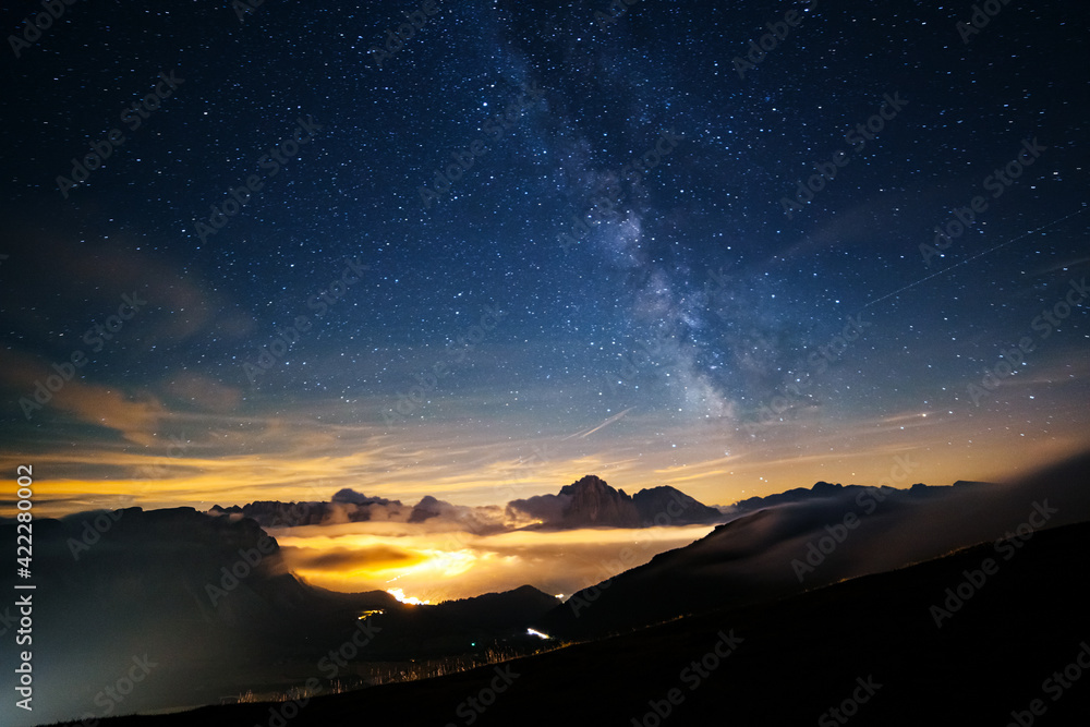 Sassolungo (Langkofel) peak under starry light. Location place natural park Dolomites, Italy, Europe.
