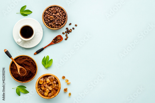 Coffee background. Coffee beans and hot drink, top view