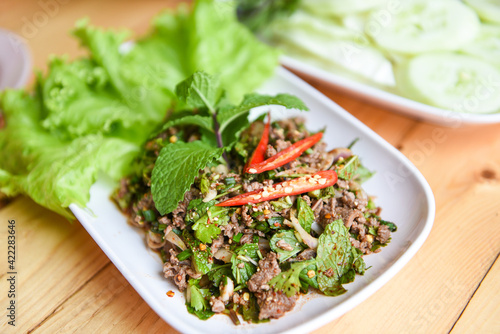 Spicy Minced Pork Salad with fresh vegetable, Beef meat Salad Thai food