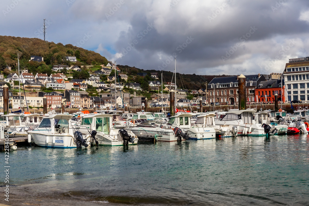 Fecamp, Normandy, France - August 28, 2020. Beautiful panoramic view on main harbor with yachts, fish sailing boats. Albaster coast.
