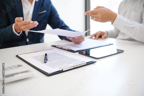 Business people signing contract making a deal with real estate agent Concept for consultant and home insurance concept.Real estate investment Property insurance and security. Real estate agent