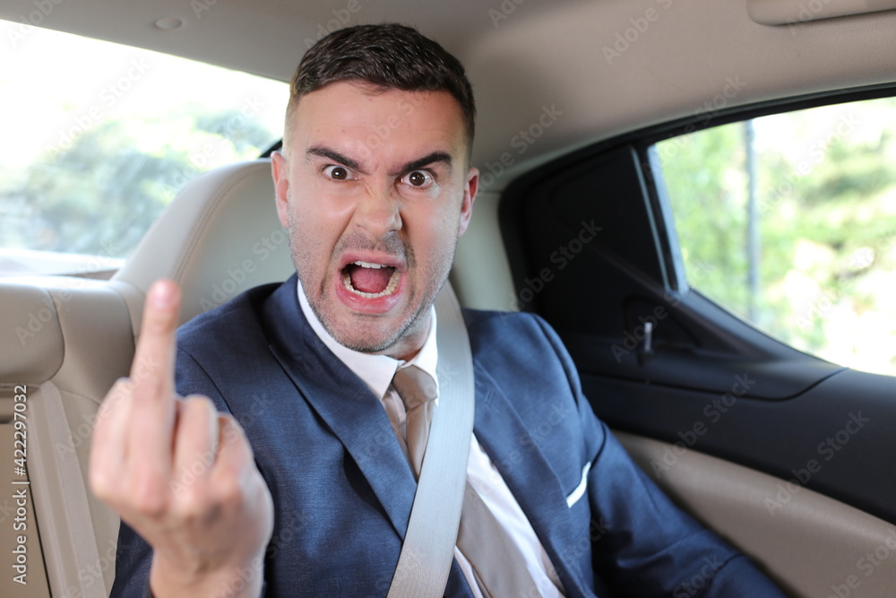 Taxi passenger showing middle finger
