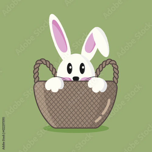 Easter holiday greeting card with cute bunny sitting in a basket 