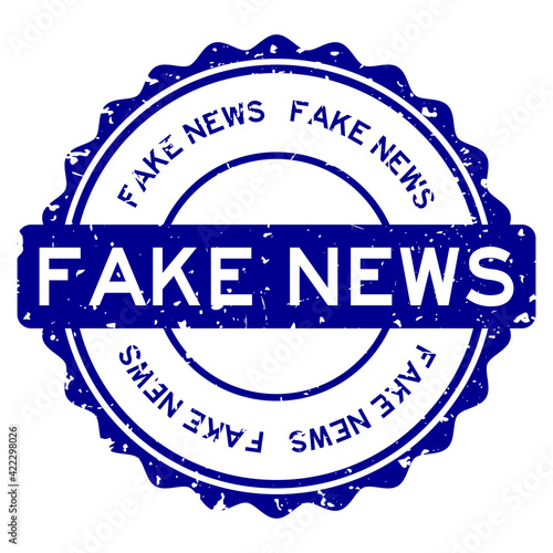 Grunge blue fake news word round rubber seal stamp on white background