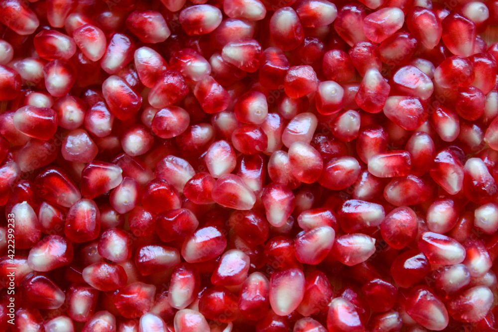 Pomegranate seeds. Macro. Close up. Red pomegranate seeds. Pomegranate seeds. Macro. Close up. Red pomegranate seeds.