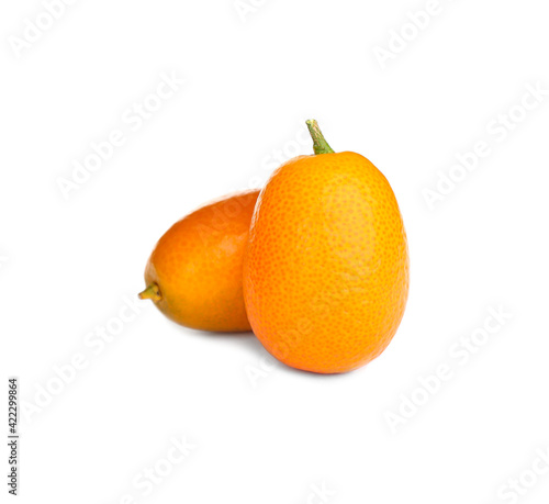 Fresh ripe kumquats on white background. Exotic fruit