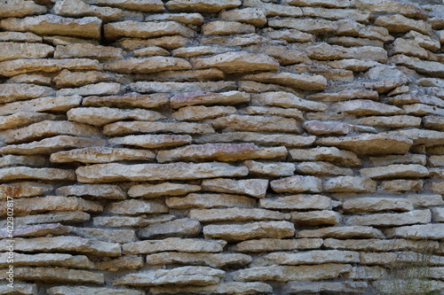 fragment of a stone wall of an ancient fortress