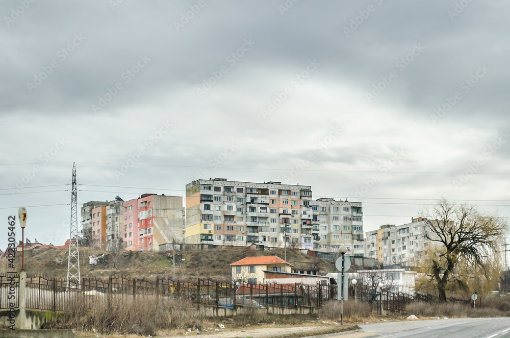 Block of Flats Complex in a Poor Neighborhood on a Hill in South Bulgaria on Winter Season. Poverty in a Balkan Country Block of Flats Complex in a Poor Neighborhood on a Hill in South Bulgaria on Winter Season. Poverty in a Balkan Country