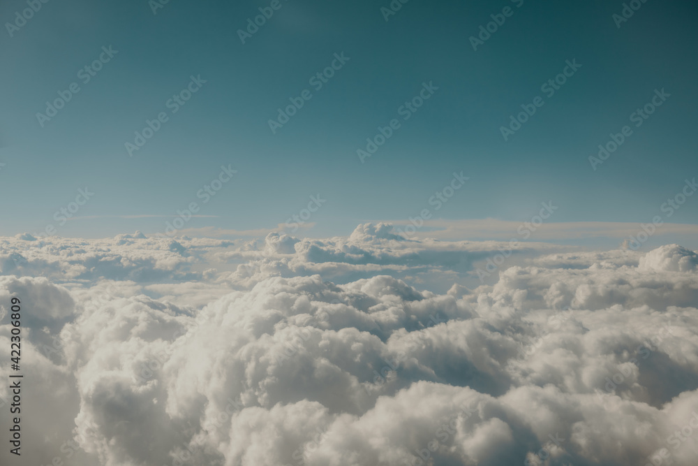 Naklejka premium Fluffy white clouds from above