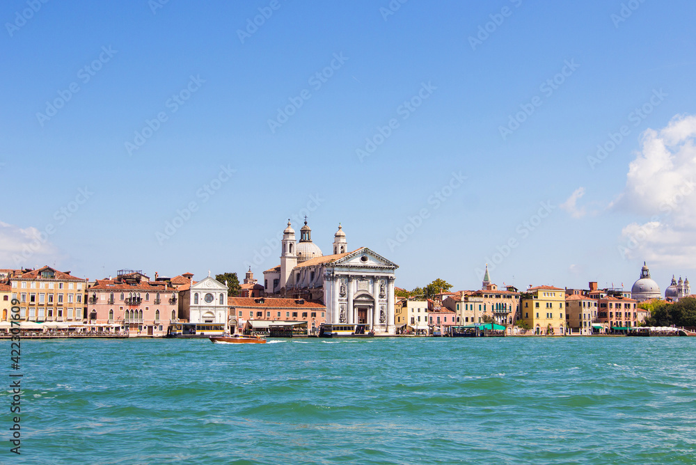 Venetian buildings view from the the Grand Canale in Venice, Italy. Italian buildings cityscape. Famous romantic city on water
