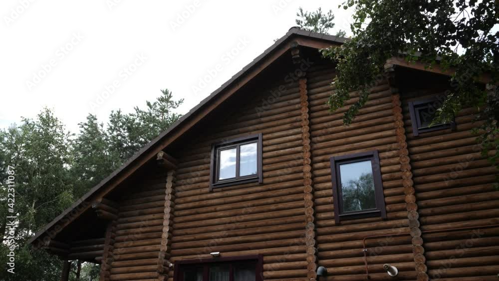 Beautiful European house made of natural wood and timber. Beautiful European house made of natural wood and timber.