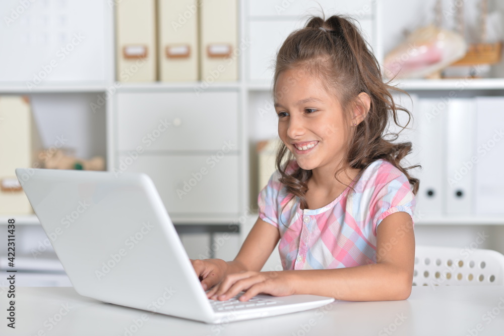Emotional cute girl using laptop Emotional cute girl using laptop