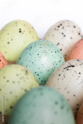 Speckled Pastel colored Eggs in Green, Blue, Pink, and White 