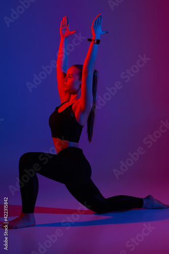 Young athletic woman is doing sport. © MaxFrost