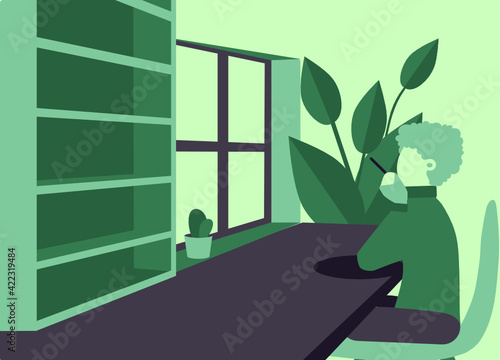 Introvert person sitting in his room look out of the window for inspiration. Nostalgy human looking for inspiration in green office.