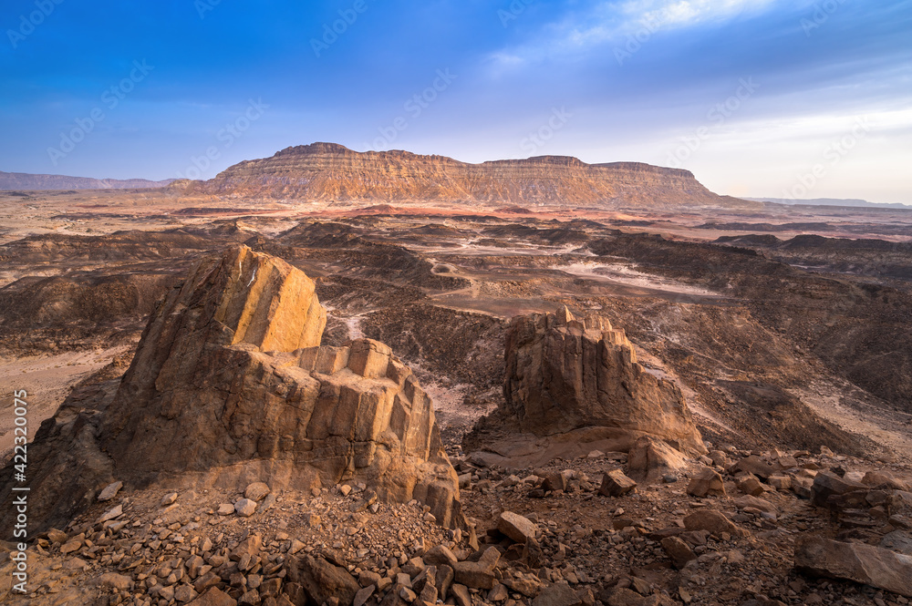 Beautiful landscape of the Ein Saharonim valley, the deepest point of the Makhtesh Ramon - largest erosion crater in the Negev desert, Israel