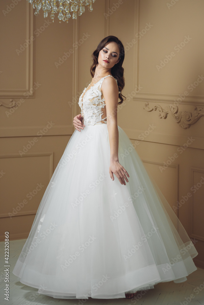 Fototapeta premium Beautiful sensual bride in light interior