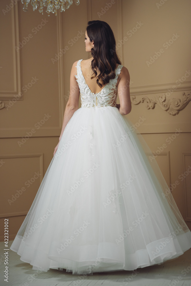 Fototapeta premium Beautiful sensual bride in light interior