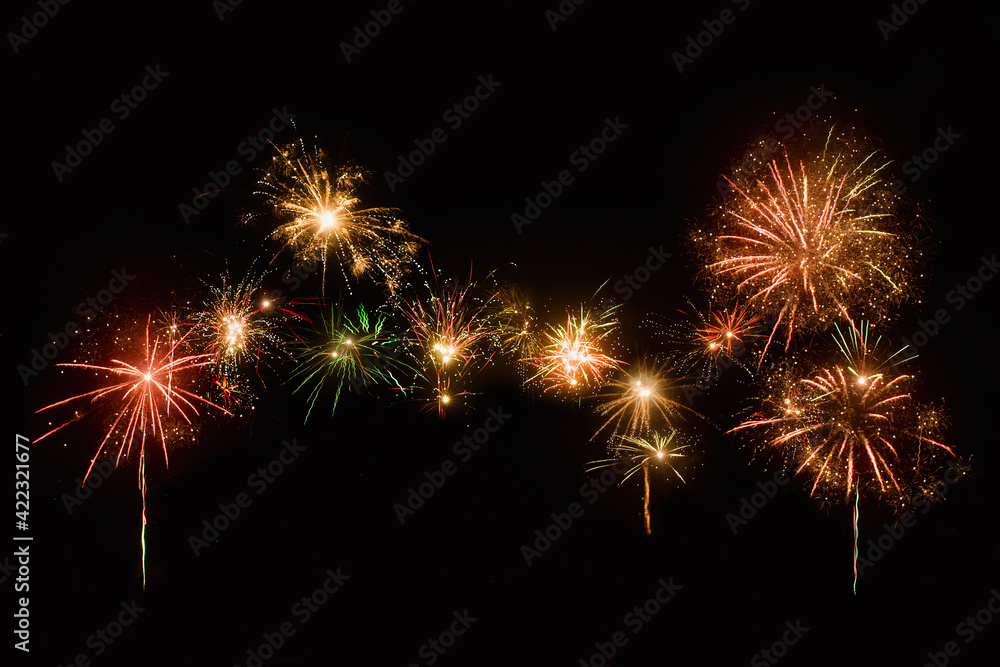 Abstract colored fireworks background with free space for text. The concept of celebrating the new year, birthday, wedding.