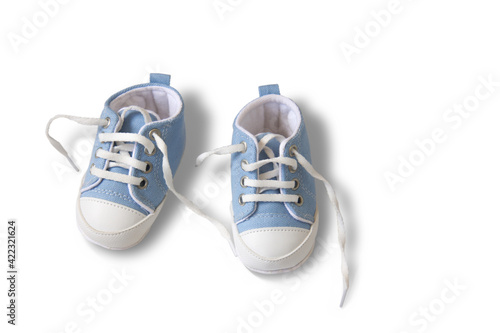 Blue first baby shoes isolated on white background