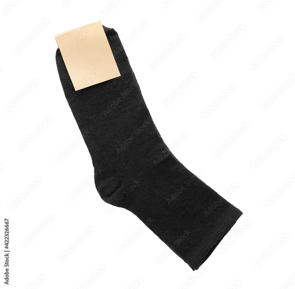 New pair of black cotton socks on white background, top view