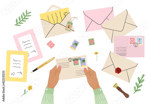 Flat lay illustration of envelopes, letters, postage stamps, stationery and tan female hands holding mails. Workspace top view. Hand drawn vector illustration
