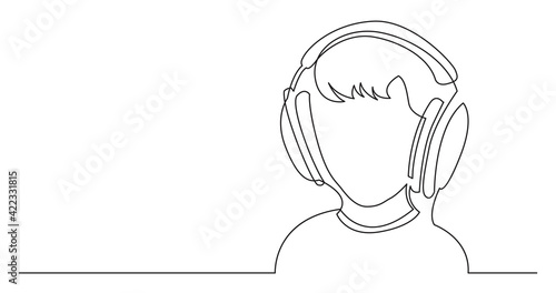 continuous line drawing of boy listening music in headphones
