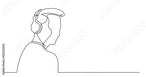 continuous line drawing of young stylish man listening music in headphones