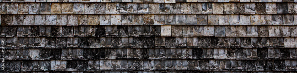 Old bricks roof in a temple for background Old bricks roof in a temple for background
