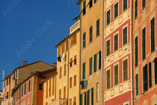 Camogli is a marine village of Liguria with tall, brightly colored Mediterranean houses.