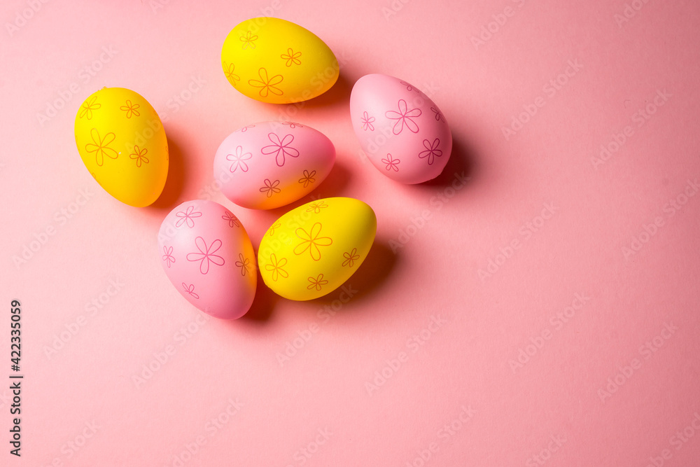 Easter eggs in the nest on light pink background. Promotion and shopping template for Easter Easter eggs in the nest on light pink background. Promotion and shopping template for Easter